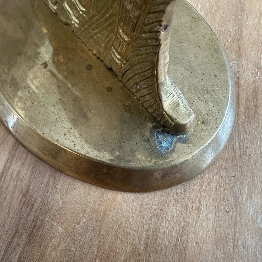 Elegant vintage brass Angel candle holder.  About 8”H Imperfection shown at base